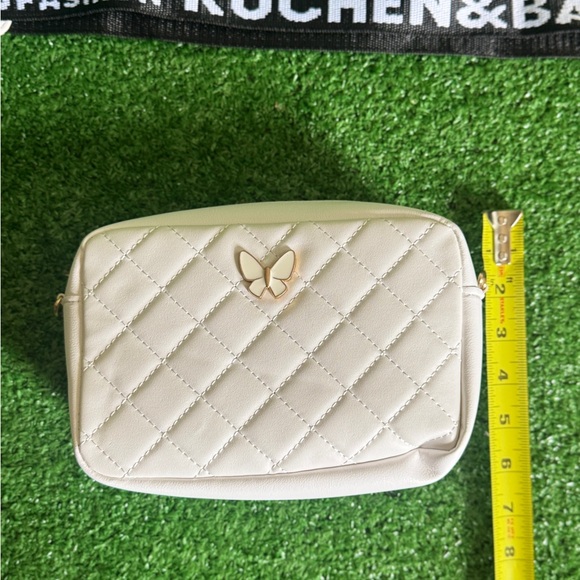 Chic Cream Quilted Crossbody Bag with Butterfly Accent - Picture 8 of 10